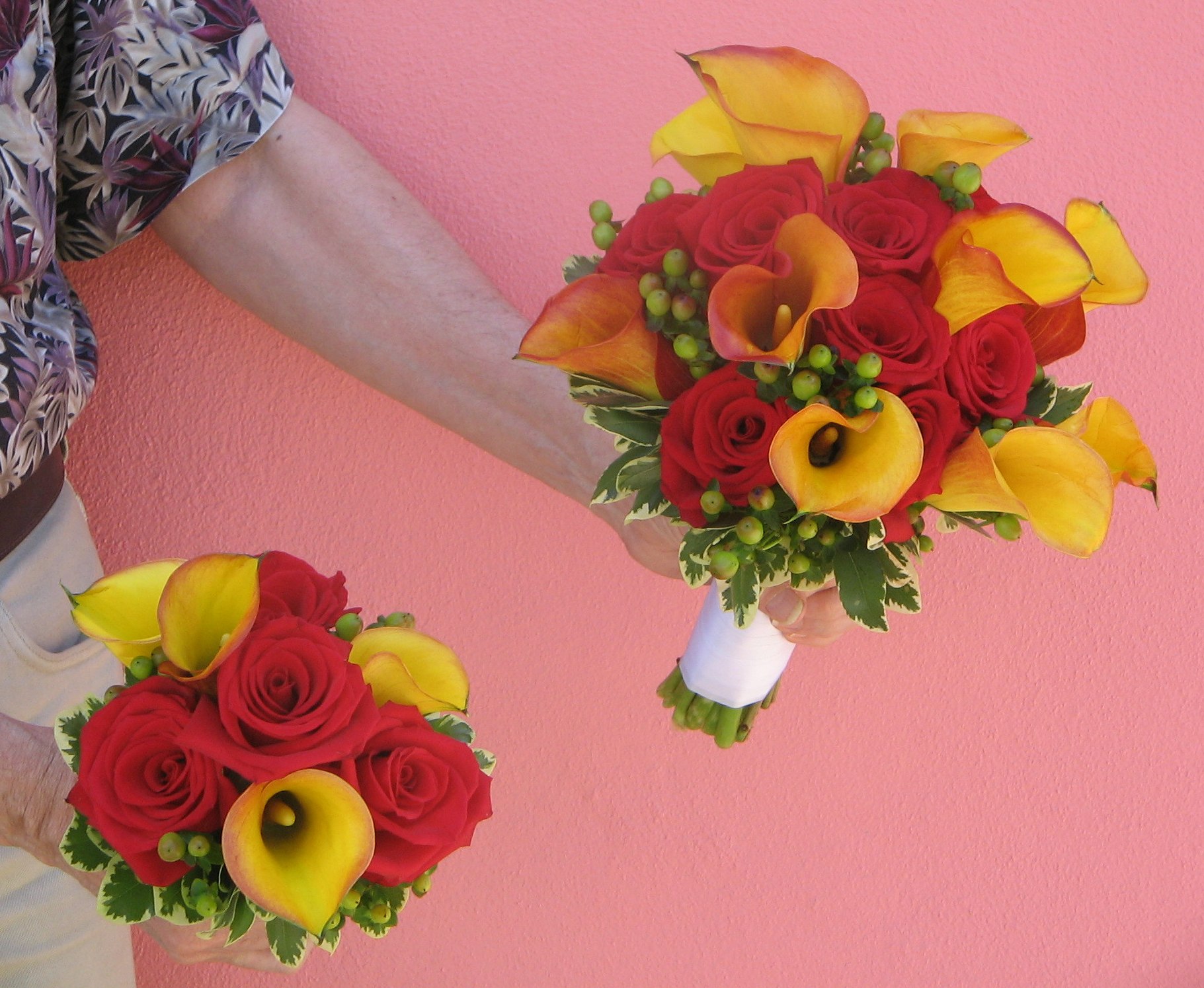 Bridal bouquet of mango callas with red roses