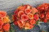 Orange Bridesmaid Bouquets by Belvedere Flowers.jpg