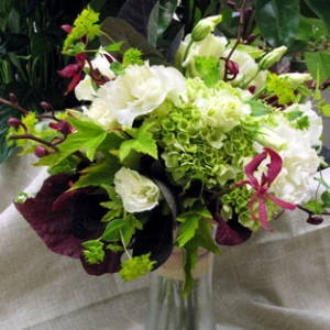 Bouquet with hydrangea, begonia leaves, orchids