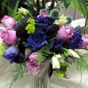 Bouquet with roses, lisianthus.