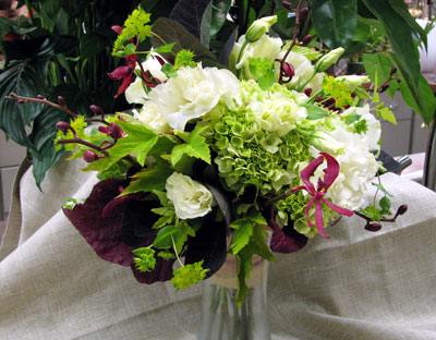 Bouquet with hydrangea, begonia leaves, orchids