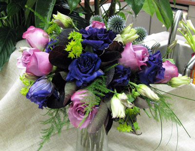 Bouquet with roses, lisianthus.