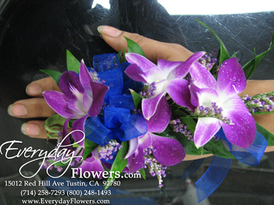 Orchid Corsage With Blue Ribbon